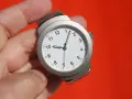 Zegarek pokazuje 9:50. Ile to godzin przy 7/8 etatu? To 35 godzin tygodniowo.